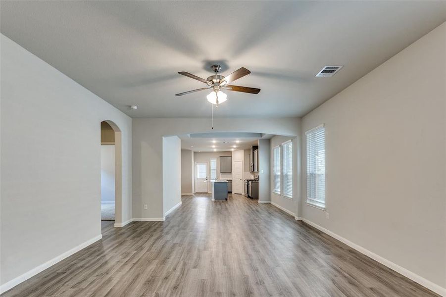 Two-inch faux wood blinds are installed throughout, and a tankless water heater is located in the garage. Two-inch faux wood blinds are installed throughout, and a tankless water heater is located in the garage.