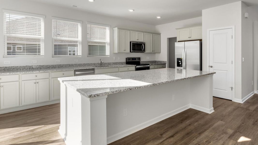 Representative furnished interior of a home built from the FORRESTER by D.R. Horton in Indigo Preserve, Leland (Image 6). Representative furnished interior of a home built from the FORRESTER by D.R. Horton in Indigo Preserve, Leland (Image 6).