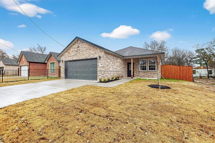 Front exterior of a new home in , Dallas, TX, highlighting curb appeal (Image 18).