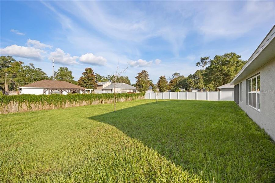 Front exterior of a new home in , Deland, FL, highlighting curb appeal (Image 13).