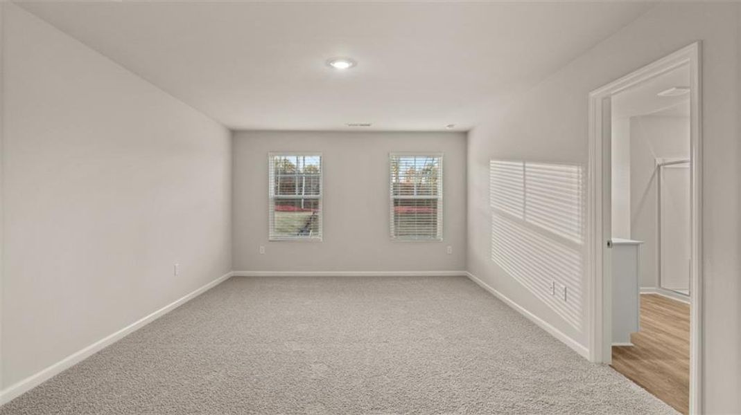 Spacious, unfurnished interior of a new home in Brooks Station, Dacula (Image 23).