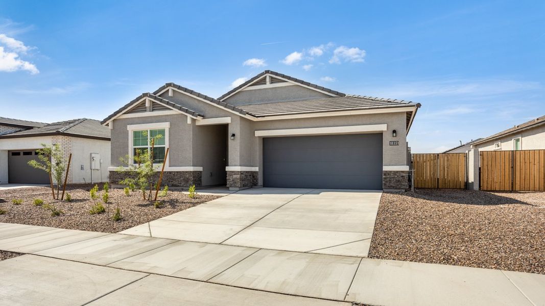 Representative exterior photo of a completed home built from the Blackstone by D.R. Horton in Rio Rancho Estates, Surprise, AZ (Image 21). Representative exterior photo of a completed home built from the Blackstone by D.R. Horton in Rio Rancho Estates, Surprise, AZ (Image 21).