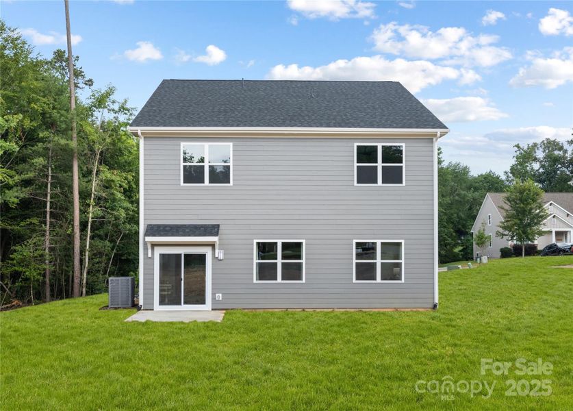 Front exterior of a new home in , Hickory, NC, highlighting curb appeal (Image 24).