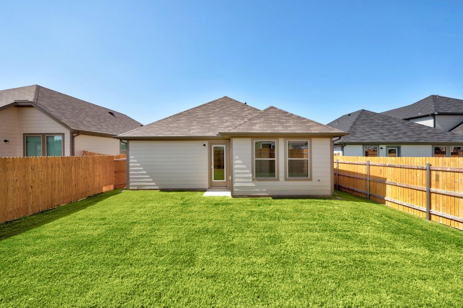 Exterior details and patio area of a home in Trinity Ranch, Elgin (Image 3).