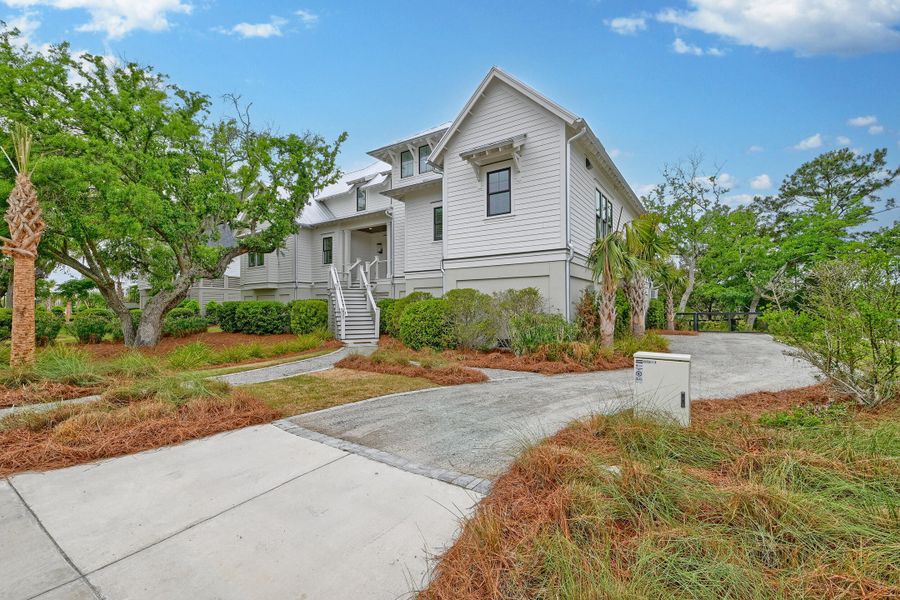 Front exterior of a new home in Daniel Island Park, Charleston, SC, highlighting curb appeal (Image 31).
