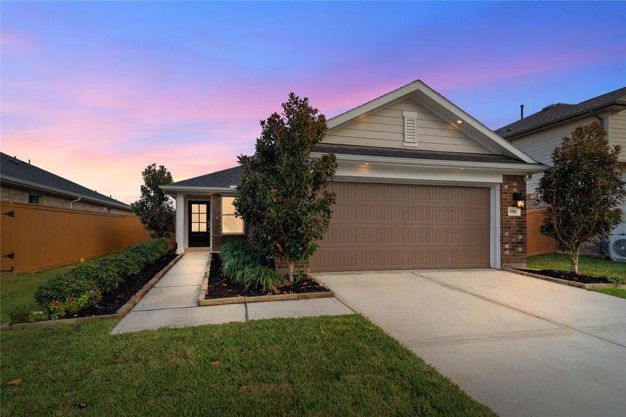 Welcome Home to 5006 Mesa Cove Drive located in Sunterra and zoned to Katy ISD.