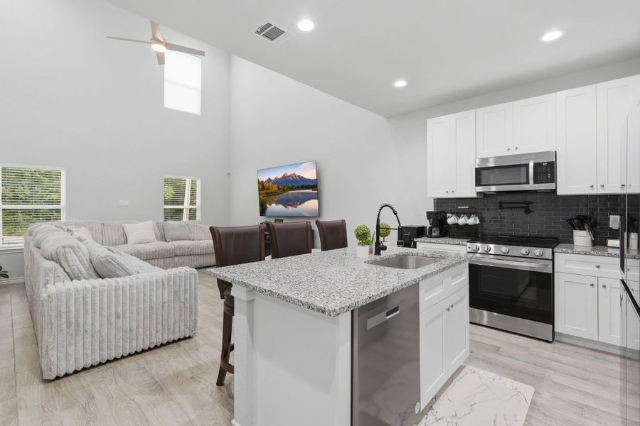 Furnished interior view inside a new home in Arrowhead Lakes, Willis (Image 6).