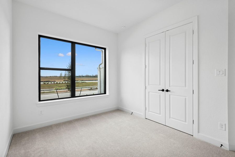 Spacious, unfurnished interior of a new home in Riceland - Enclave Row Collection, Mont Belvieu (Image 22).
