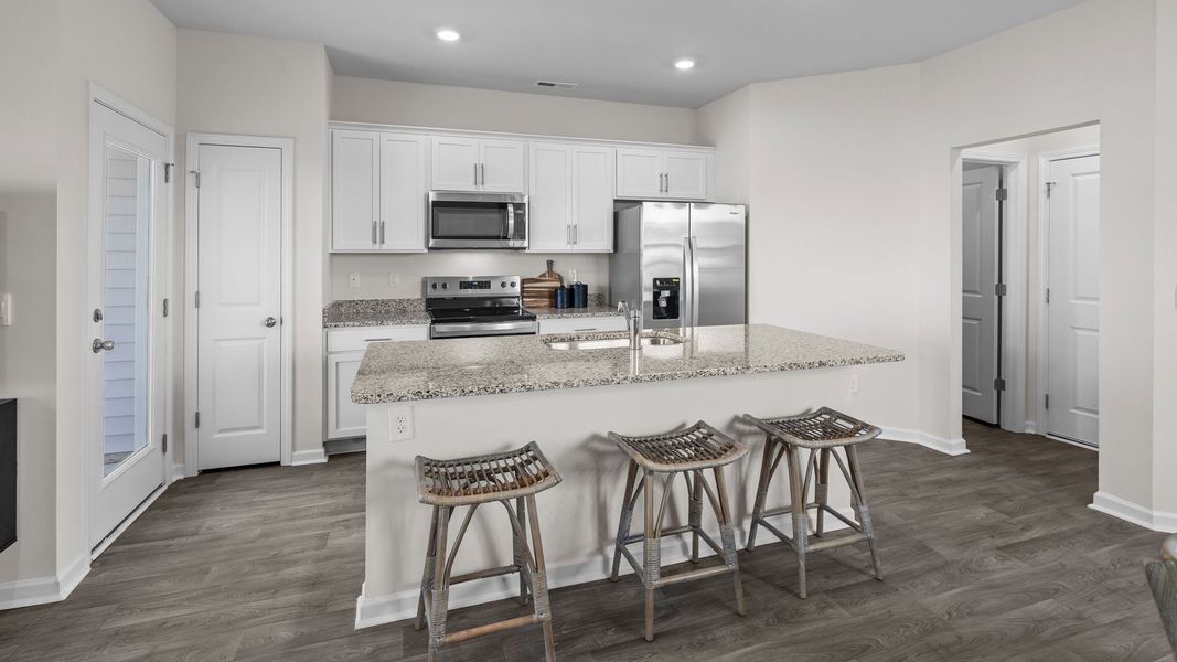 Furnished interior view inside a new home in The Townes at Ridgewood Farms, Winterville (Image 8).