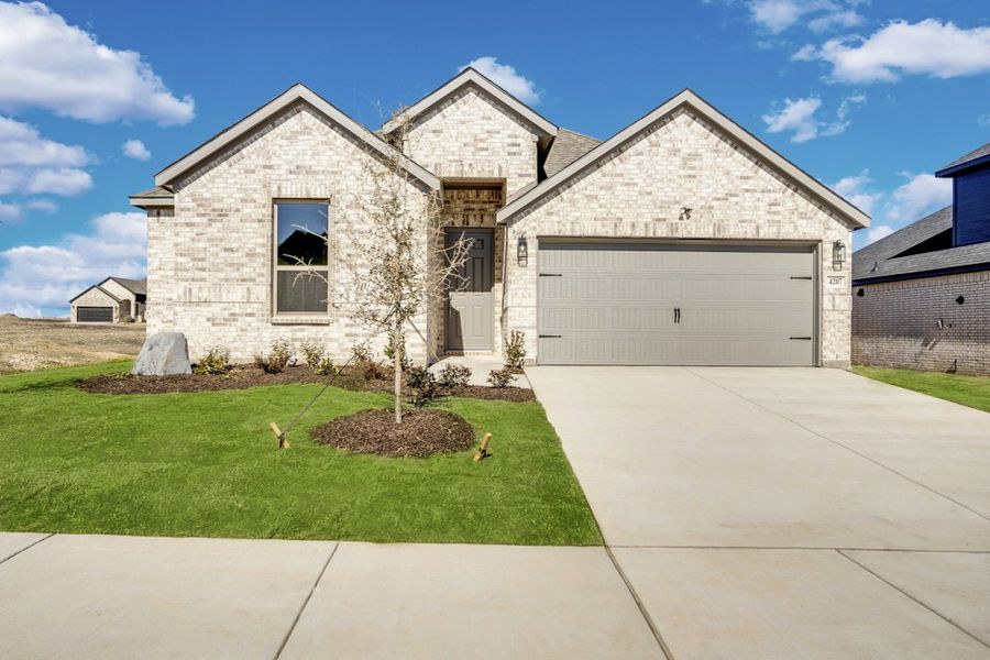 Representative exterior photo of a completed home built from the The Amherst by Lillian Custom Homes in Freeman Farm, Kaufman, TX (Image 26). Representative exterior photo of a completed home built from the The Amherst by Lillian Custom Homes in Freeman Farm, Kaufman, TX (Image 26).