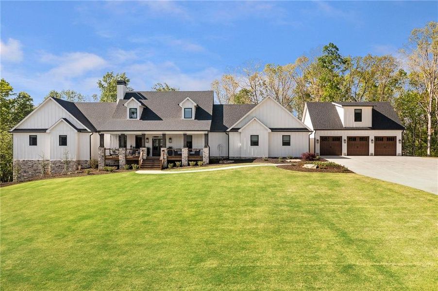 Front exterior of a new home in , Canton, GA, highlighting curb appeal (Image 24).