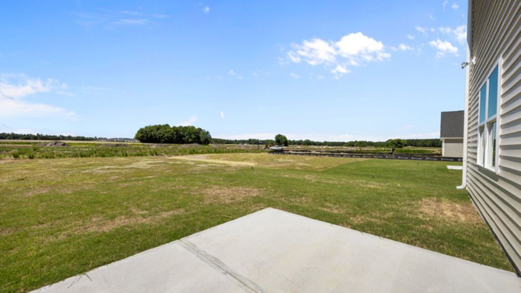 Exterior details and patio area of a home in East Ridge, Ayden (Image 3).