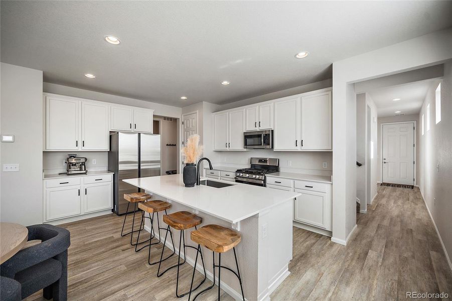 Furnished interior view inside a new home in Paint Brush Hills, Peyton (Image 13).