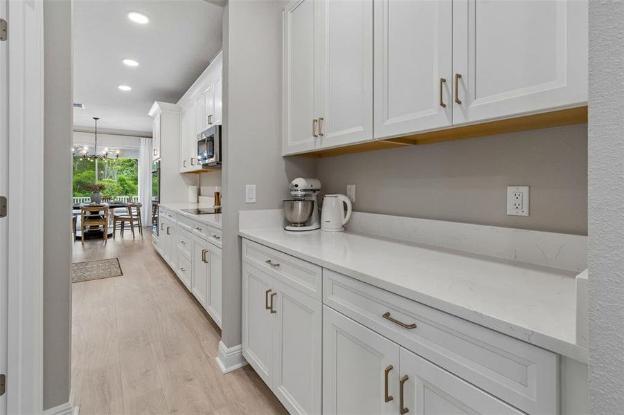 Furnished interior view inside a new home in Whispering Oaks Preserve, Wesley Chapel (Image 11).