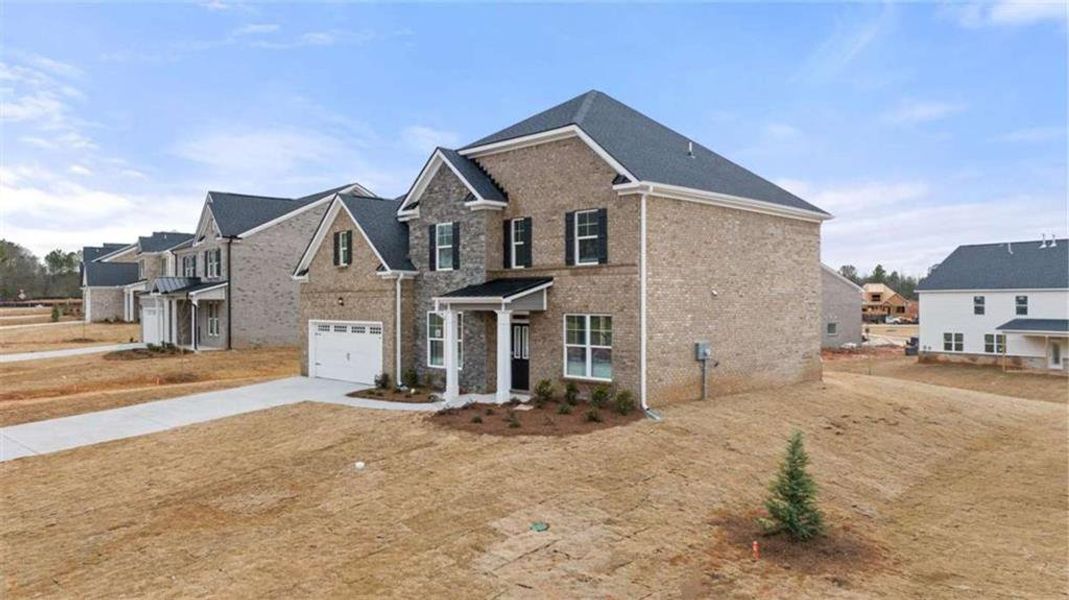 Exterior details and patio area of a home in The Gates at Pates Creek, Hampton (Image 3).