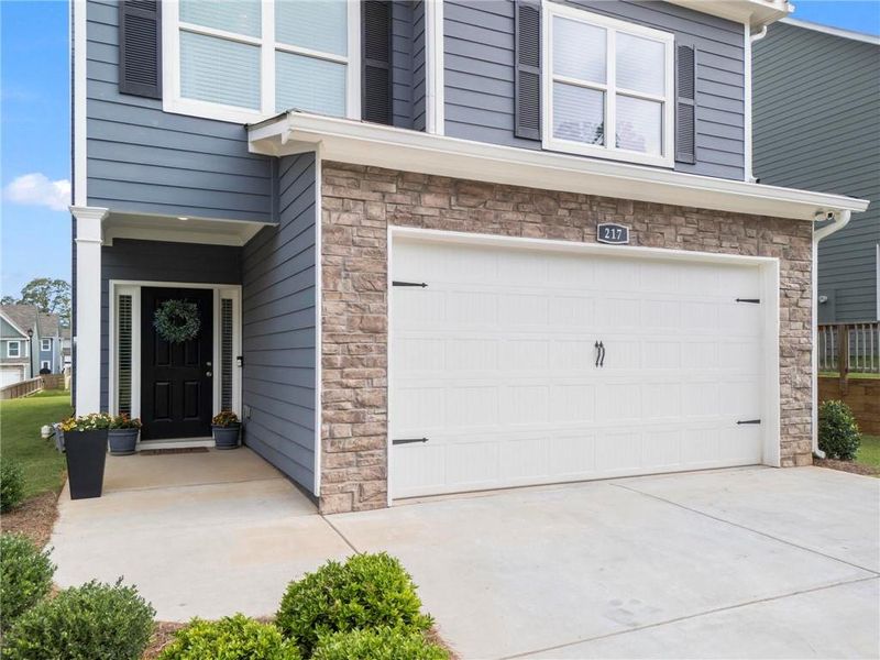 Front exterior of a new home in , Cartersville, GA, highlighting curb appeal (Image 20).