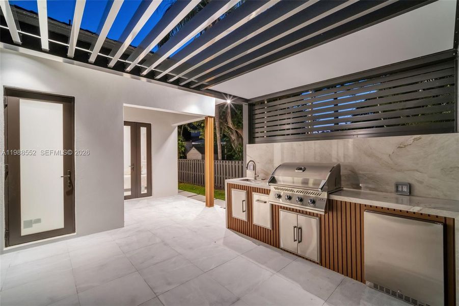 Exterior details and patio area of a home in , Miami Shores (Image 36).