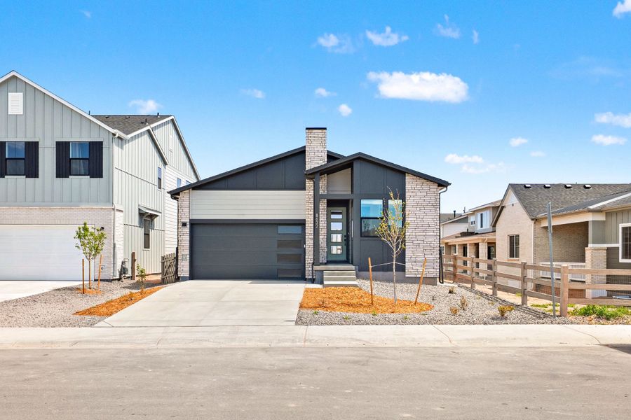 Front exterior of a new home in Trumark Homes at Sterling Ranch, Littleton, CO, highlighting curb appeal (Image 20).