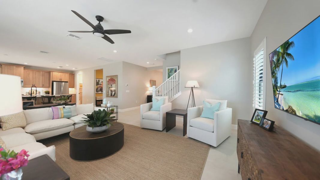Representative furnished interior of a home built from the Artistry by Neal Communities in SkySail, Naples (Image 24).