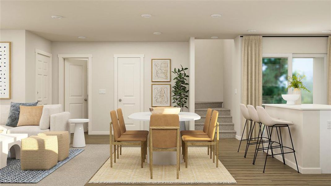 Dining area featuring wood finished floors and recessed lighting Dining area featuring wood finished floors and recessed lighting