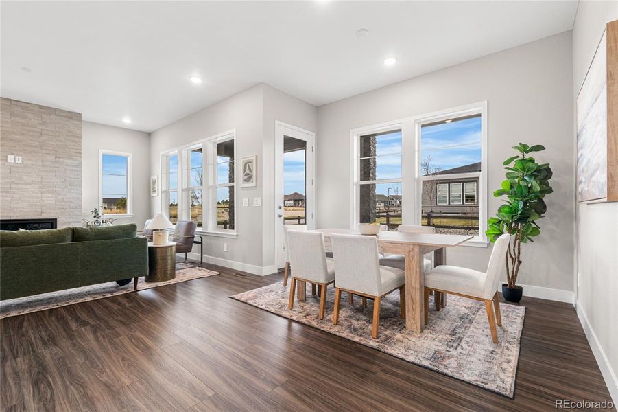 Furnished interior view inside a new home in Hilltop at Inspiration, Aurora (Image 12).