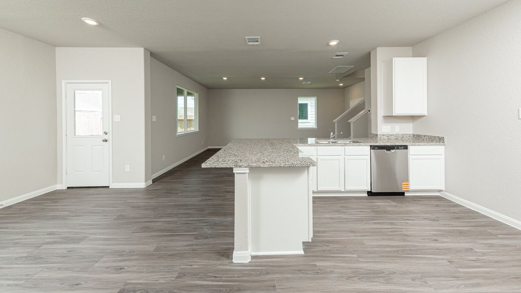 Kitchen and Dining Area to Family Room Kitchen and Dining Area to Family Room