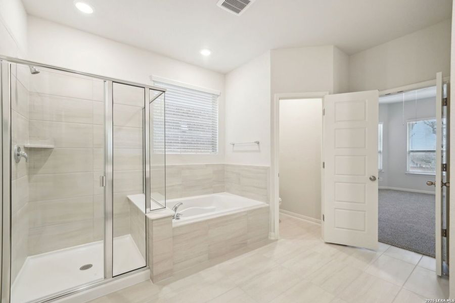 Furnished interior view inside a new home in Estancia Ranch - Classic Series, San Antonio (Image 18).