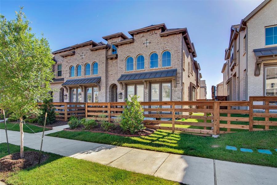 Front exterior of a new home in , Sherman, TX, highlighting curb appeal (Image 1).