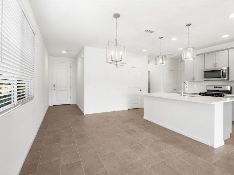Spacious, unfurnished interior of a new home in Mandarina - Premier Series, Marana (Image 7). Spacious, unfurnished interior of a new home in Mandarina - Premier Series, Marana (Image 7).