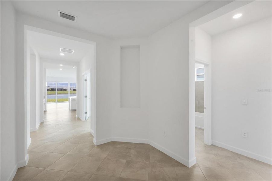 Spacious, unfurnished interior of a new home in , Port Charlotte (Image 30).