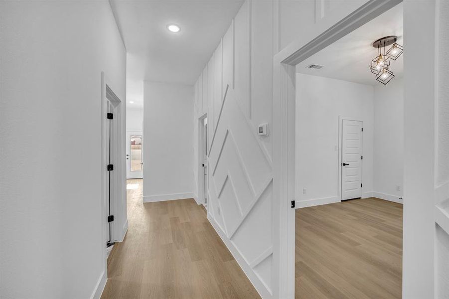 Hallway featuring light wood-type flooring