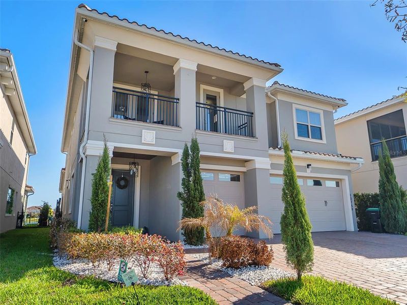 Front exterior of a new home in , Orlando, FL, highlighting curb appeal (Image 24).