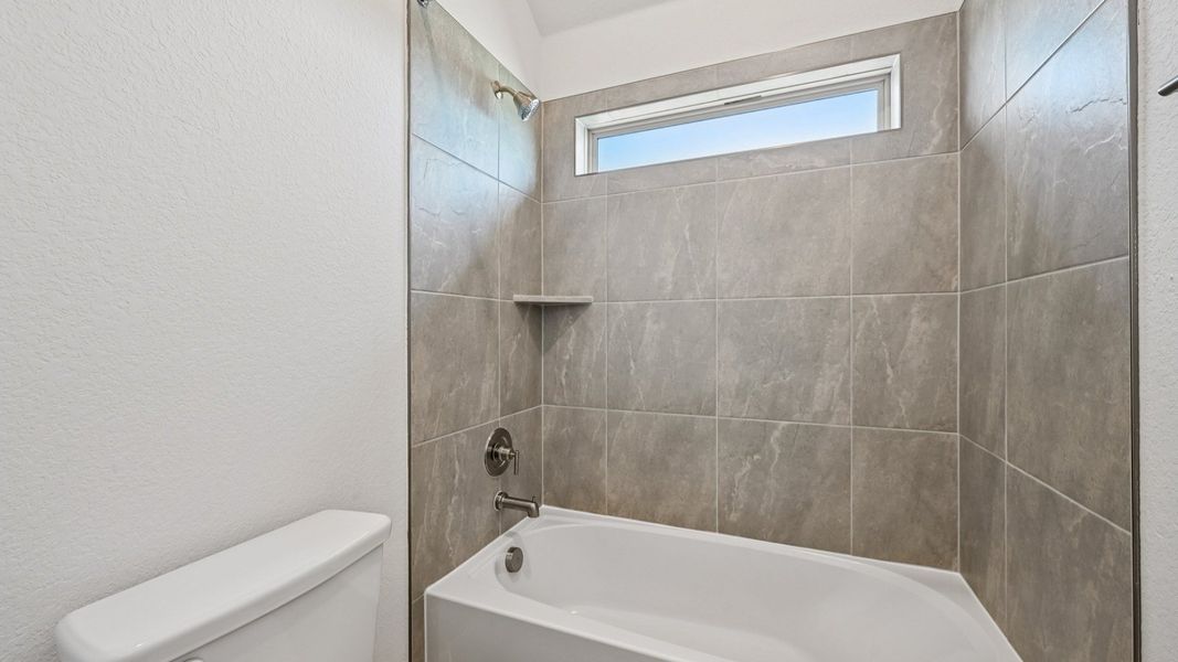 Furnished interior view inside a new home in Flora, Hutto (Image 34).