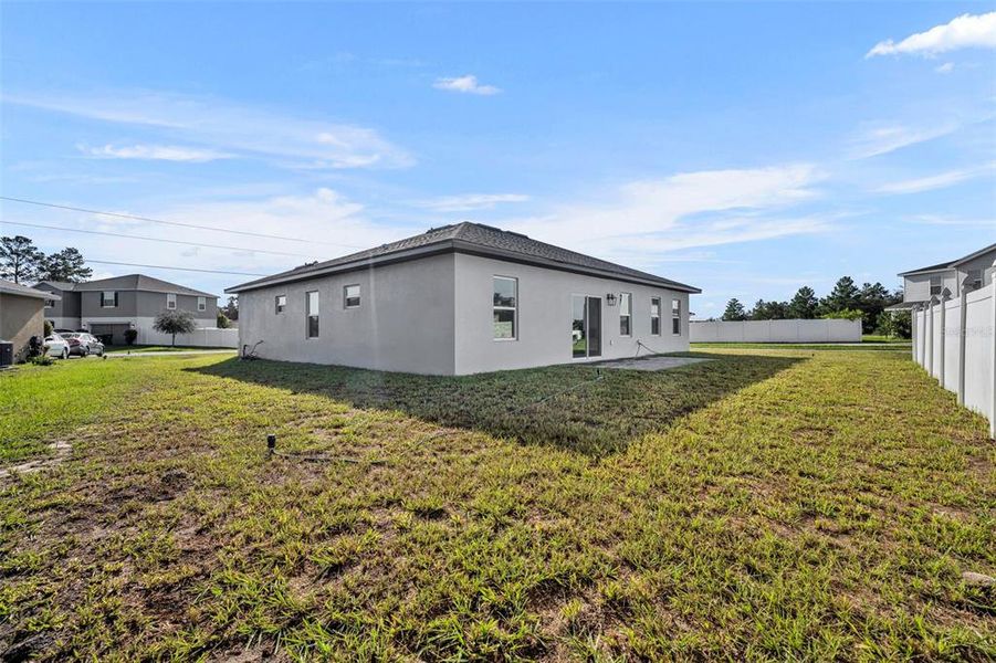 Exterior details and patio area of a home in , Poinciana (Image 2). Exterior details and patio area of a home in , Poinciana (Image 2).