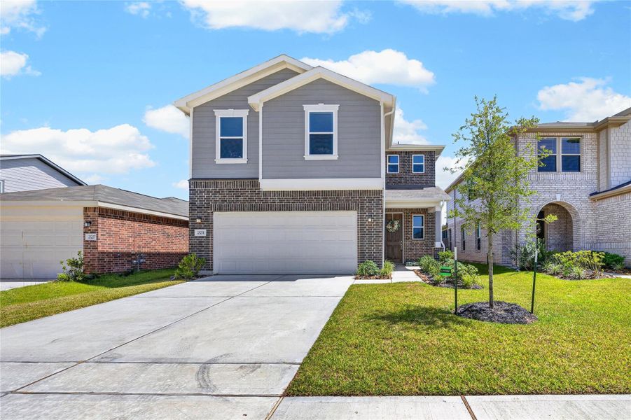 Front exterior of a new home in , Katy, TX, highlighting curb appeal (Image 24).