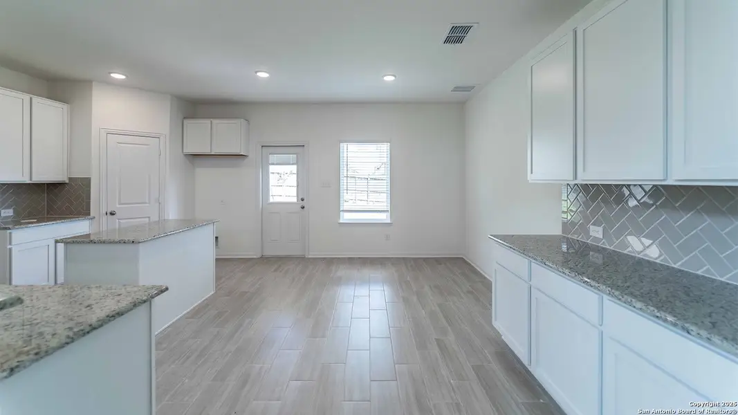 Furnished interior view inside a new home in Hunter's Ranch, San Antonio (Image 5).