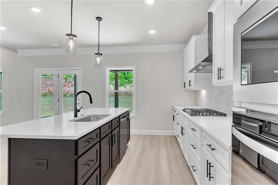 Furnished interior view inside a new home in Hidden Fields, Hoschton (Image 9).