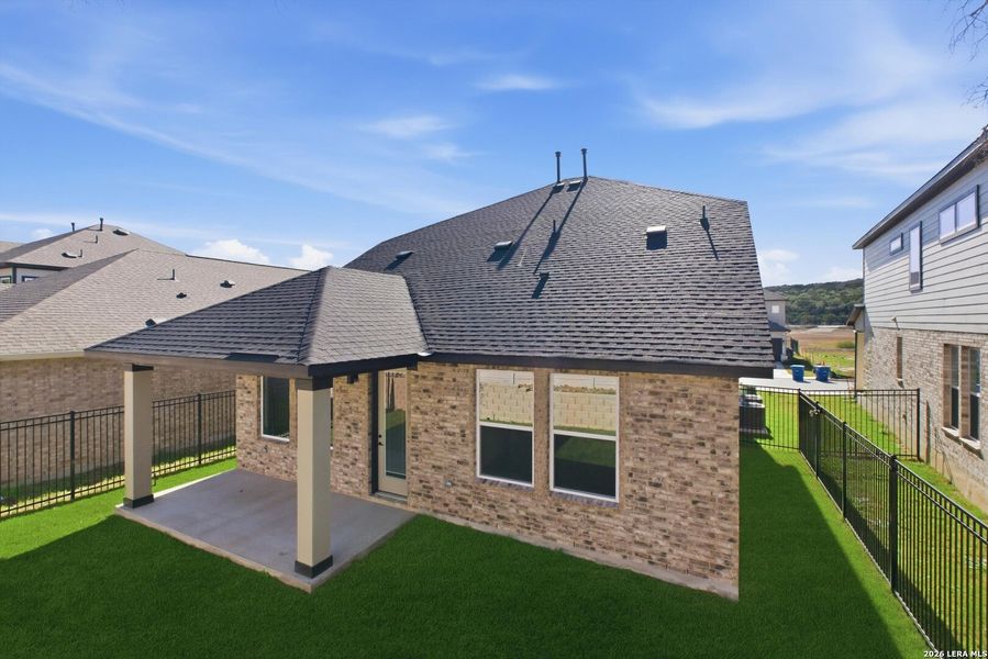 Exterior details and patio area of a home in Crown Ridge Manor, San Antonio (Image 4).