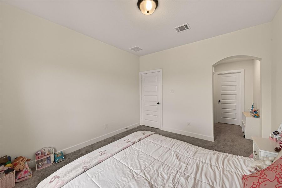 The secondary bedroom provides a comfortable retreat with ample closet space. The secondary bedroom provides a comfortable retreat with ample closet space.