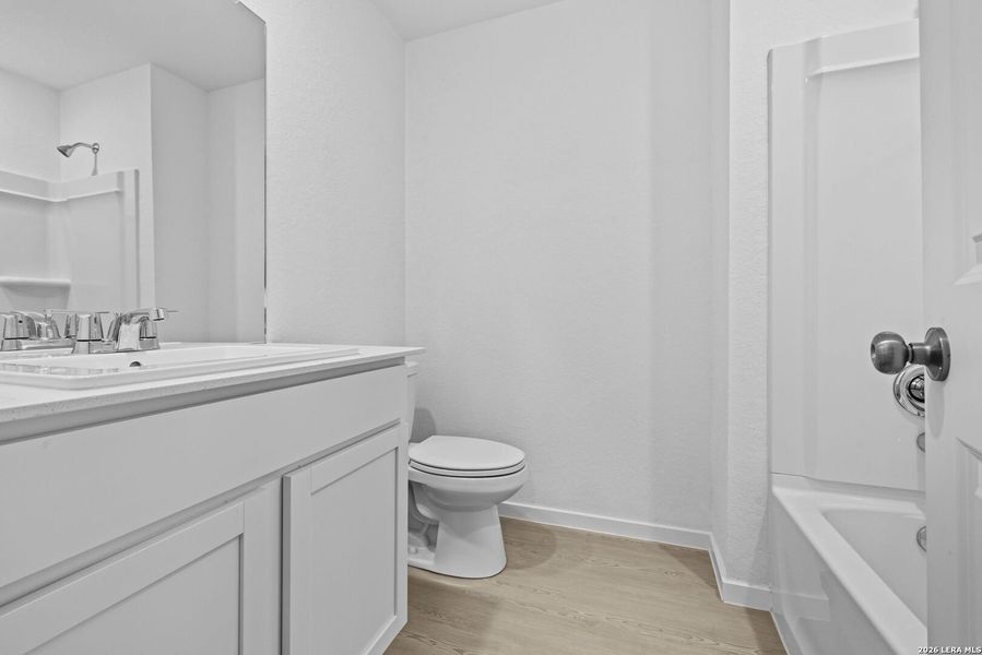 Furnished interior view inside a new home in Spring Grove, St. Hedwig (Image 5).