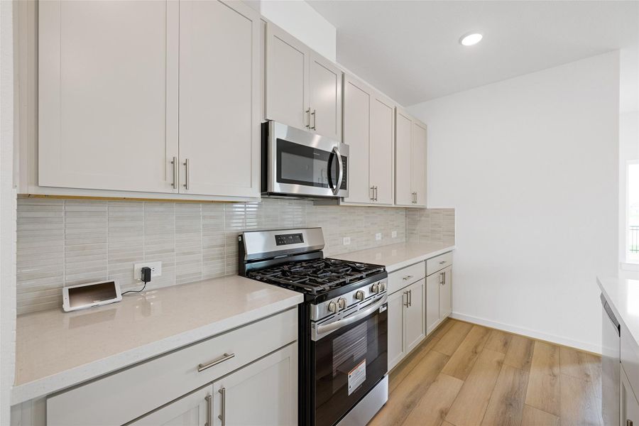 Furnished interior view inside a new home in Sunterra, Katy (Image 6). Furnished interior view inside a new home in Sunterra, Katy (Image 6).