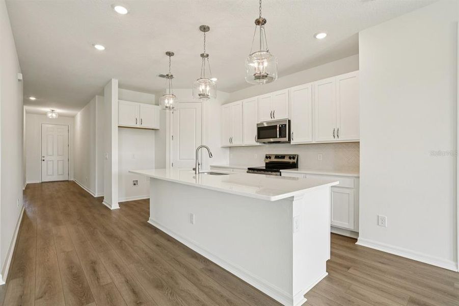 Furnished interior view inside a new home in Sunbrooke, St. Cloud (Image 4). Furnished interior view inside a new home in Sunbrooke, St. Cloud (Image 4).
