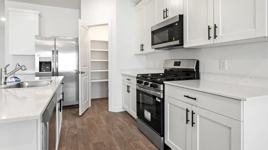 Furnished interior view inside a new home in Emberly, Beasley (Image 3).
