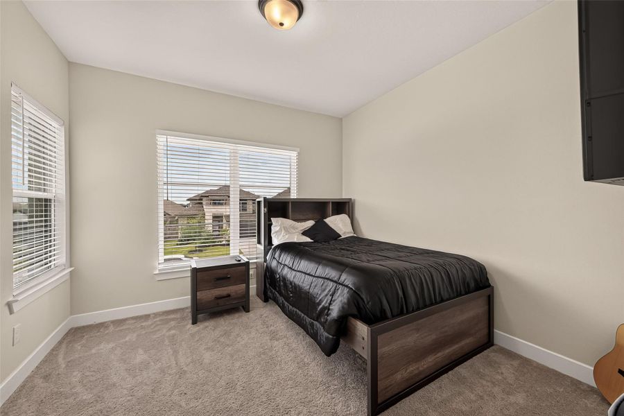 Inviting secondary bedroom, perfect for family or guests. Inviting secondary bedroom, perfect for family or guests.