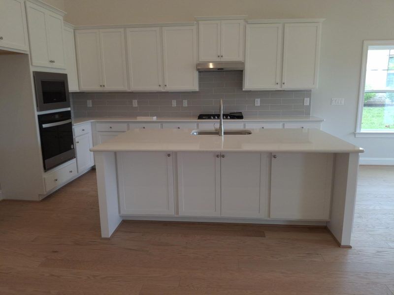 Furnished interior view inside a new home in Weybridge, Burlington (Image 5).