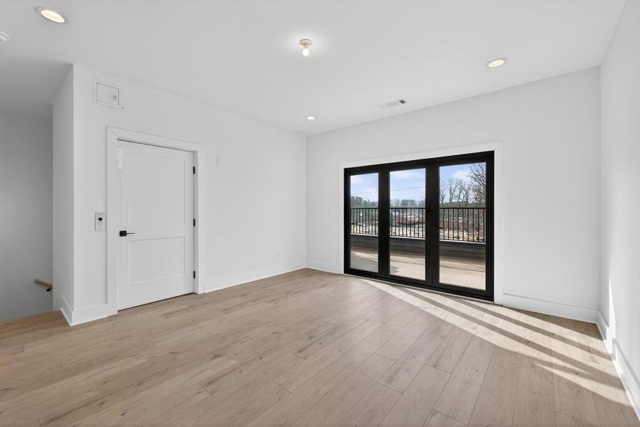 Spacious, unfurnished interior of a new home in Skyview On Broad, Sugar Hill (Image 29). Spacious, unfurnished interior of a new home in Skyview On Broad, Sugar Hill (Image 29).