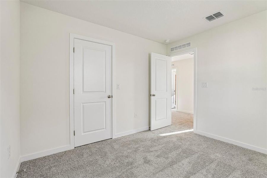 Spacious, unfurnished interior of a new home in Cyrene at Harmony, St. Cloud (Image 25).