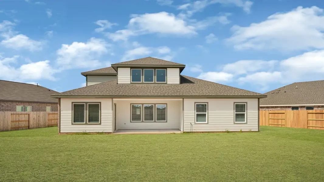 Exterior details and patio area of a home in Harvest Pointe, Needville (Image 2).