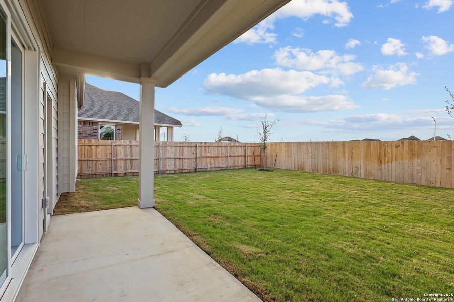 Exterior details and patio area of a home in Sunflower Ridge, New Braunfels (Image 4).