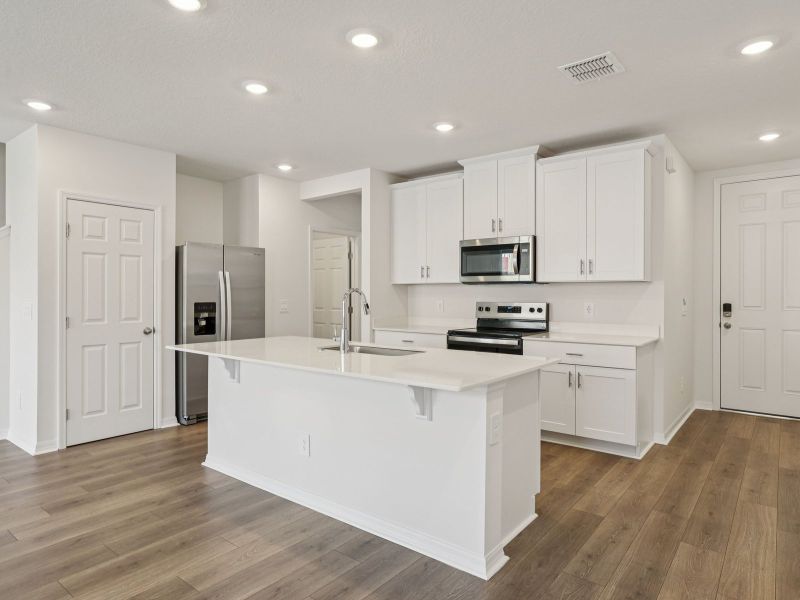 Furnished interior view inside a new home in The Meadow at Crossprairie Townes, St. Cloud (Image 4). Furnished interior view inside a new home in The Meadow at Crossprairie Townes, St. Cloud (Image 4).